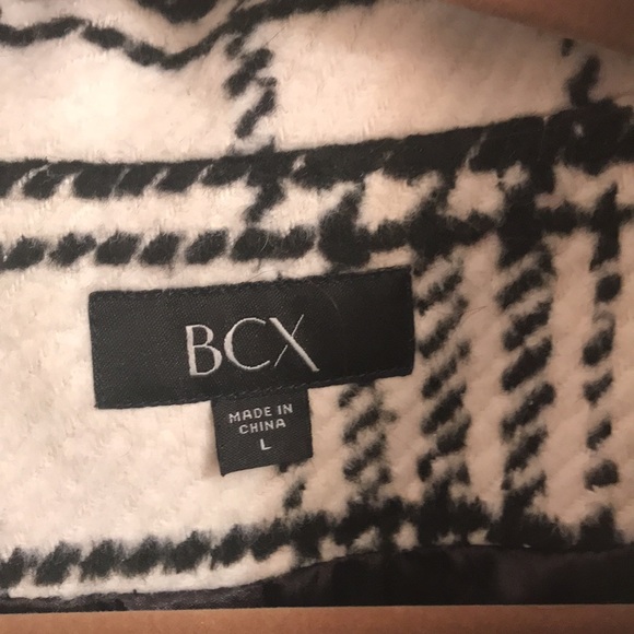 This is a nice fall winter black and white pea coat. - Picture 2 of 3